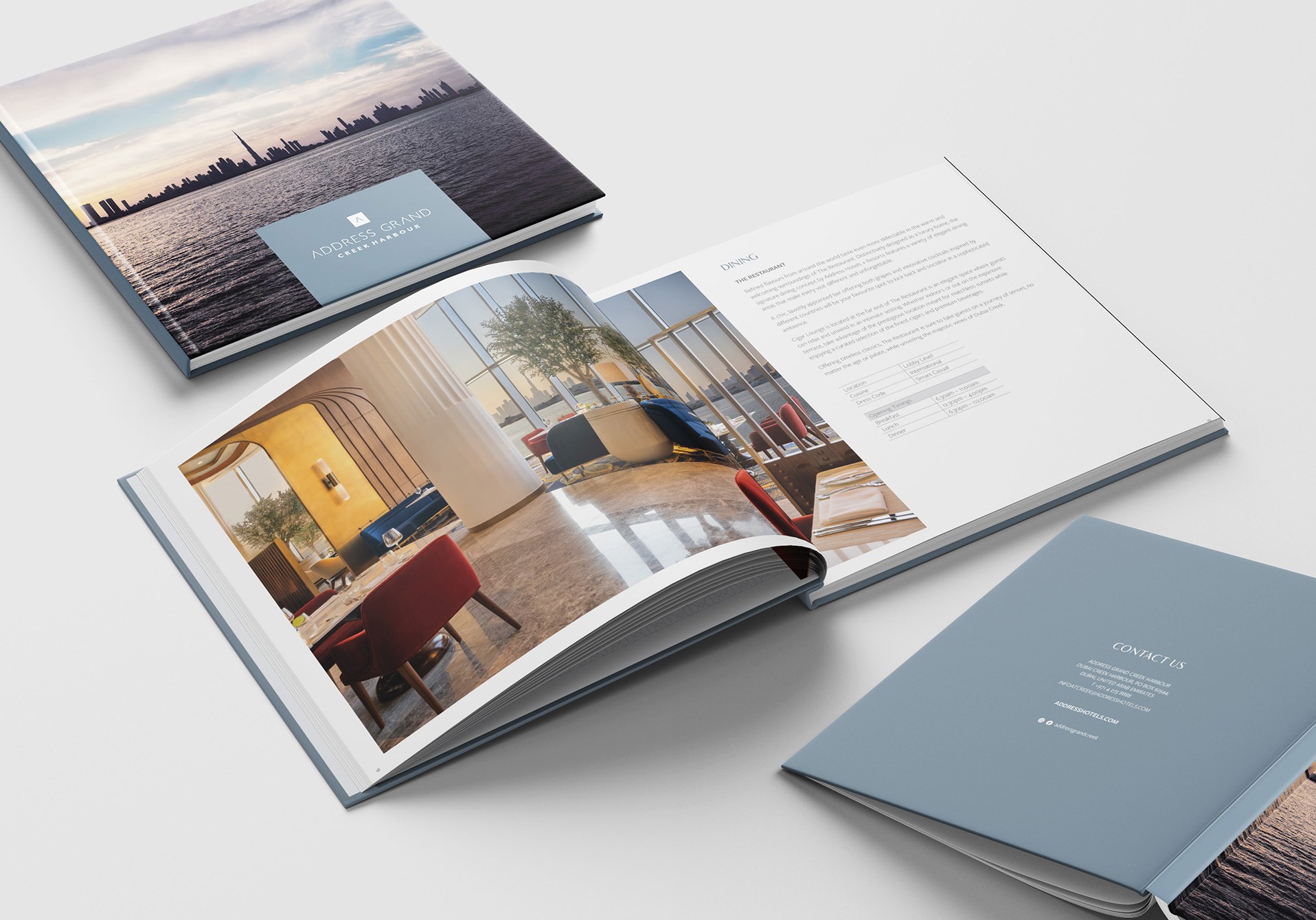 The Address brochure opened to a suite spread
