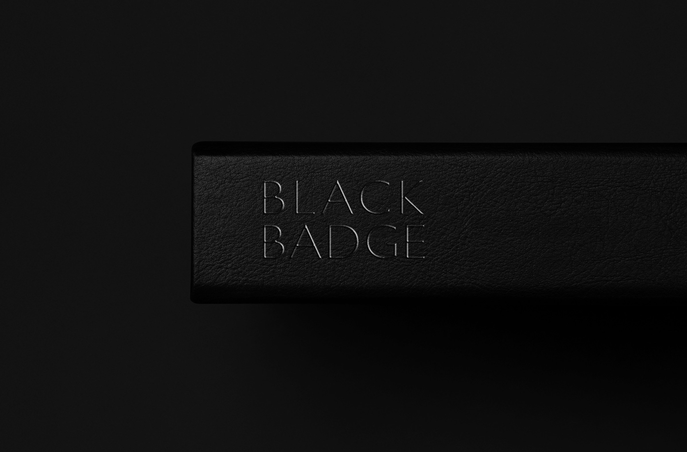 The Black Badge wordmark, debossed