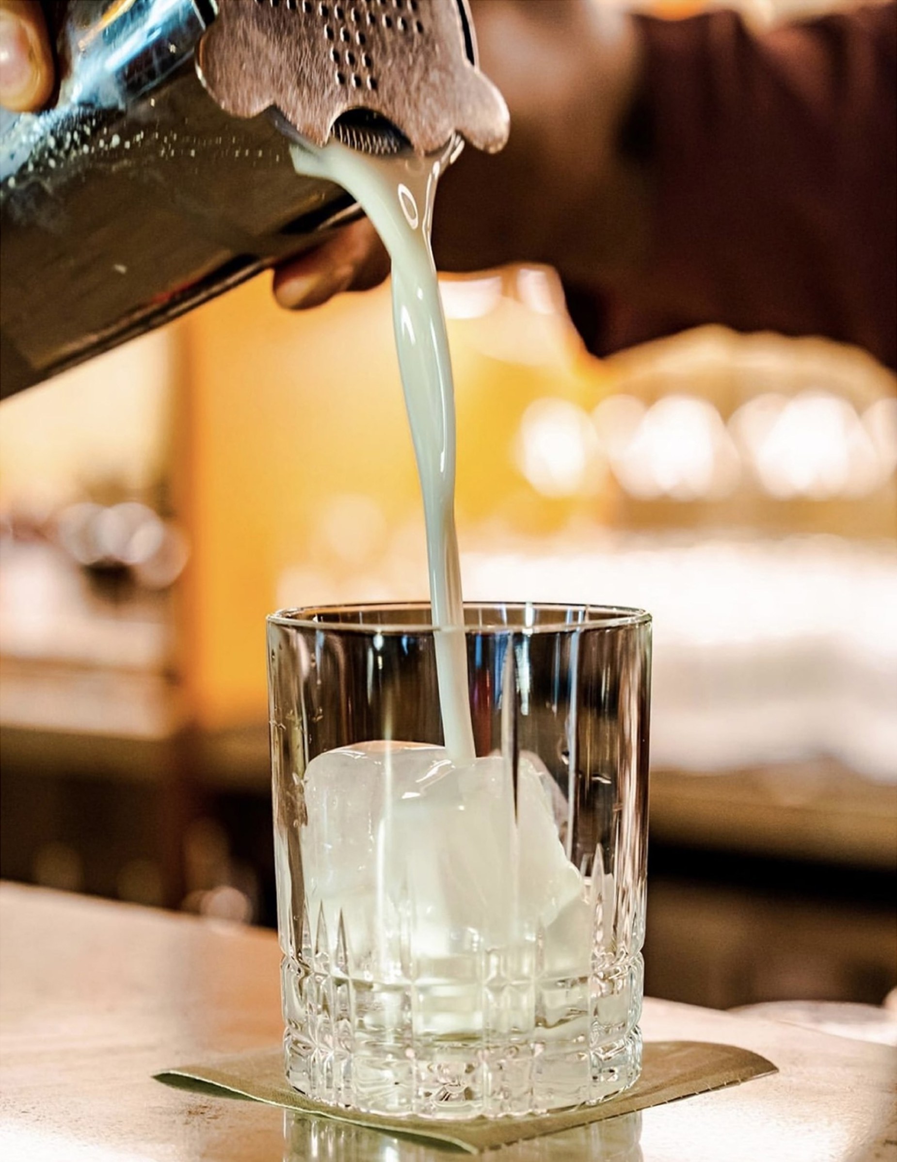 A Thiptara cocktail being poured