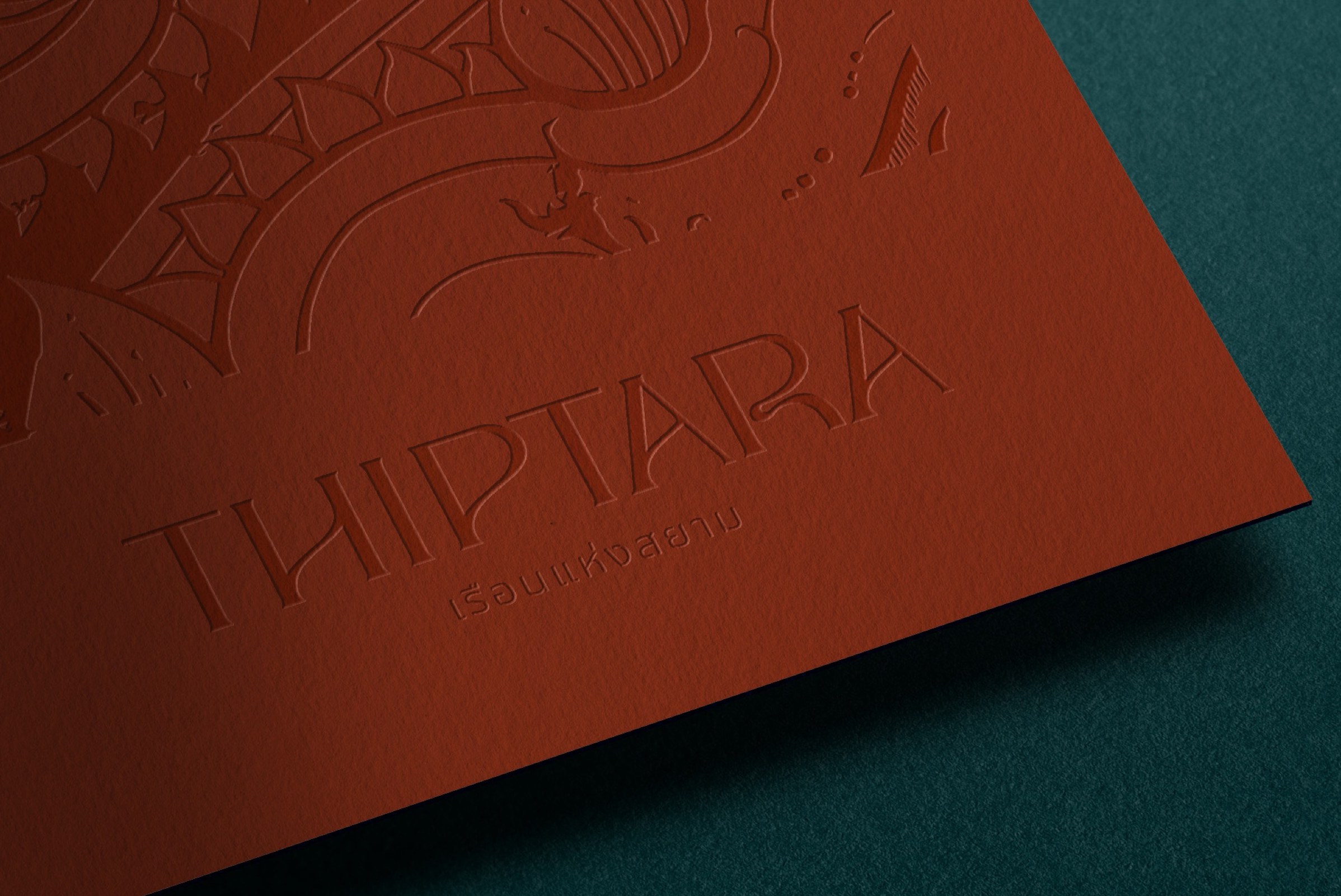 A close-up of the embossed Thiptara wordmark
