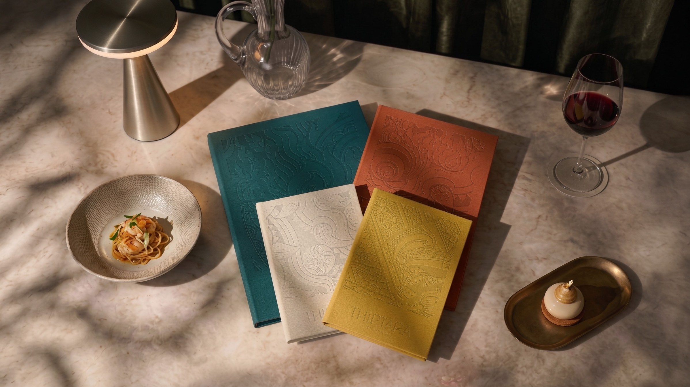 The Thiptara menu system in its jewel-tone colourways