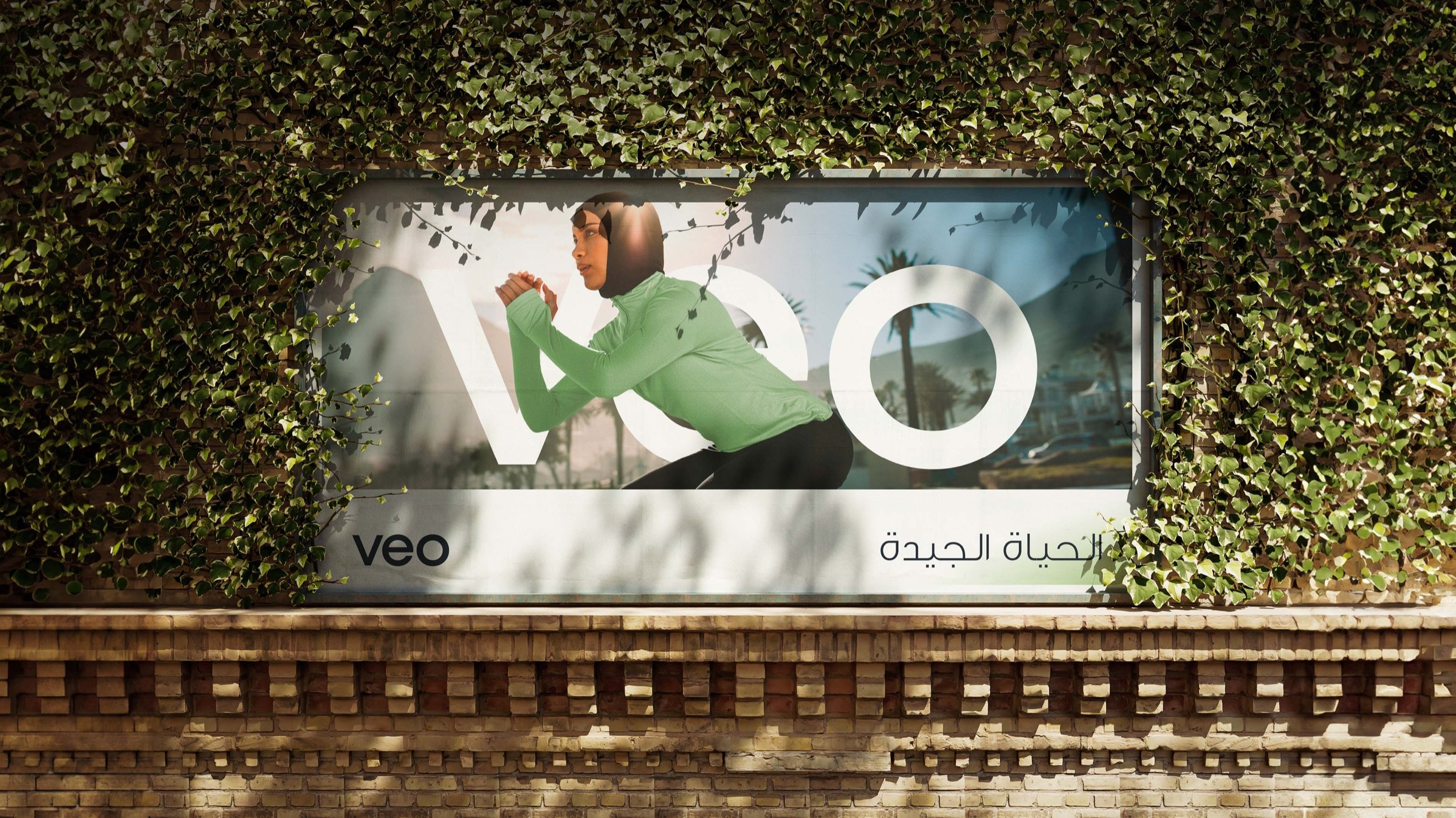 A Veo billboard — “the good life”, in Arabic and English