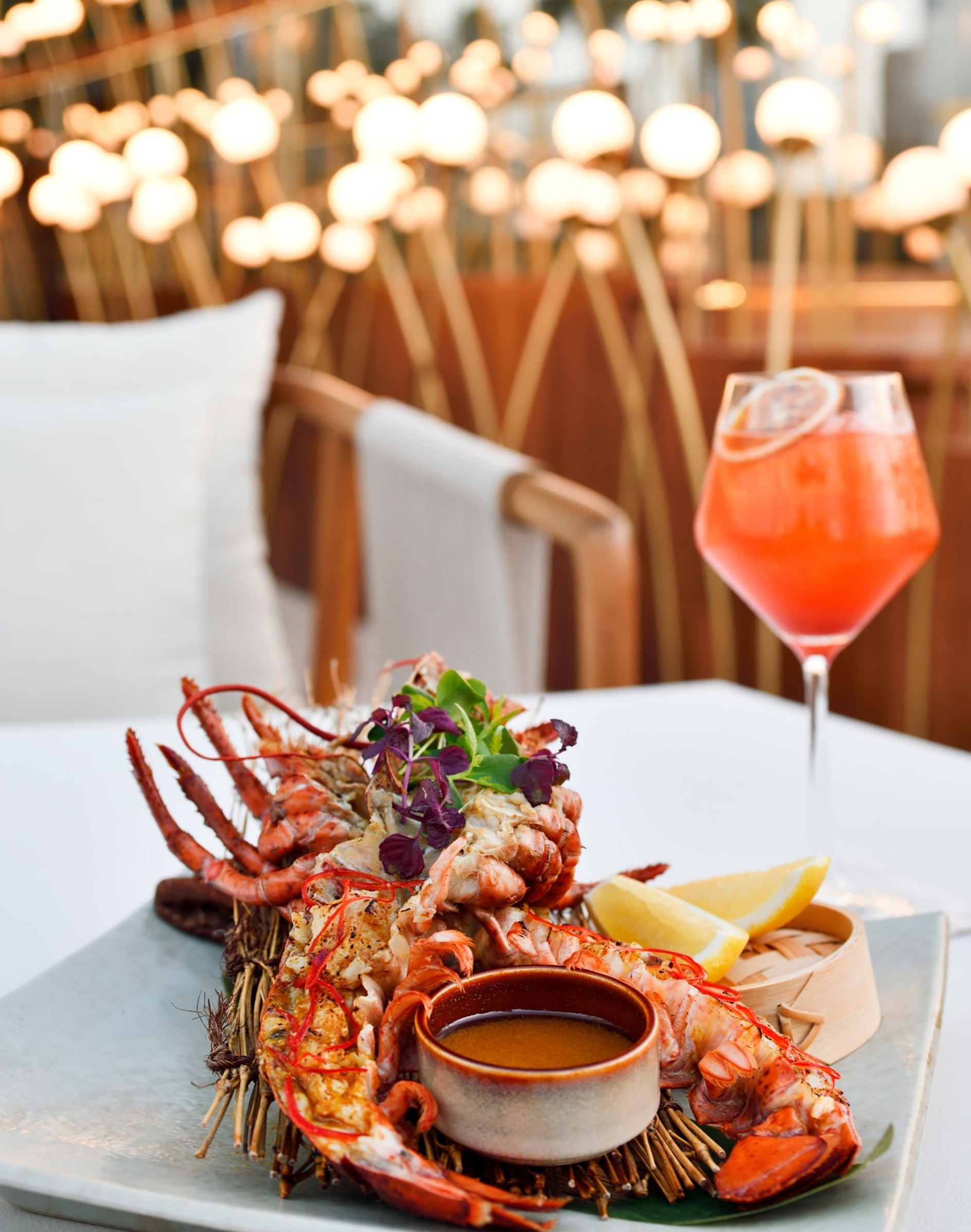 A Zeta seafood plate with a signature cocktail